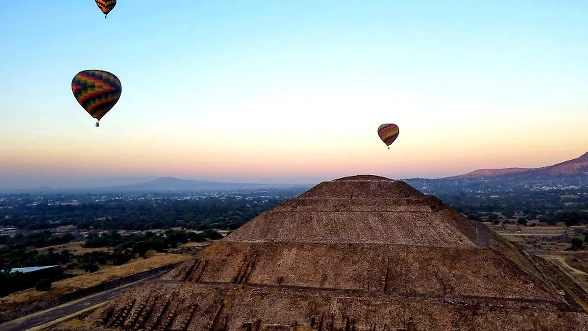 Placeholder cover showing early morning light on the Teotihuacan pyramids